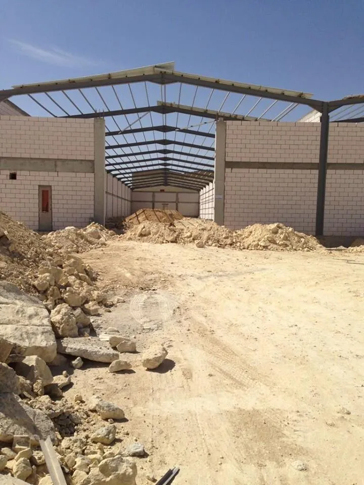 شركتنا: خبراء في حلول التخزين لبناء هناجر في المملكة